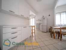 Soggiorno con angolo cottura