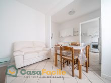 Soggiorno con angolo cottura