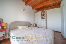 Camera da letto singola con balcone loggiato